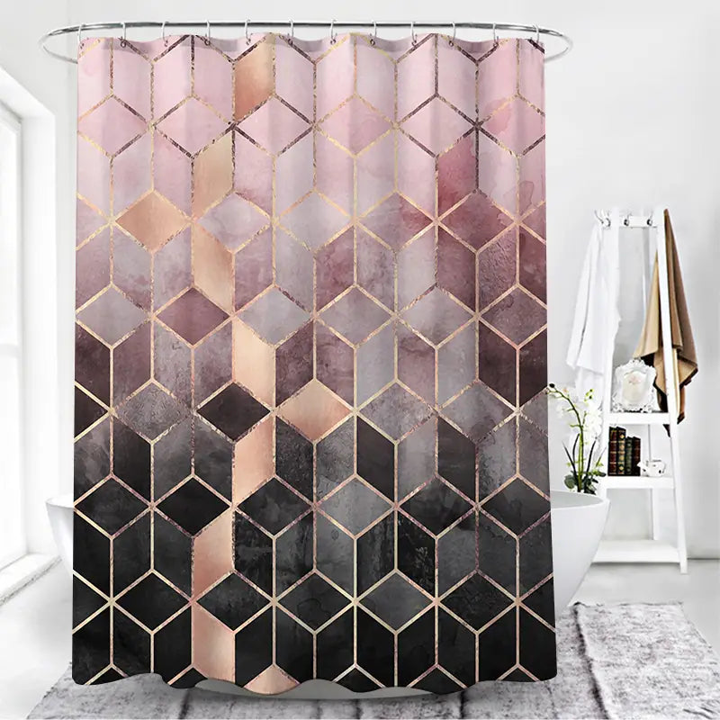 Modern geometric navy and gold shower curtain with a gradient pattern of rose gold mauve and black hexagons featuring metallic outlines.