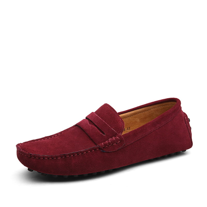 A rich burgundy suede leather loafer for men featuring a classic moccasin design with stitched detailing ideal for casual wear.