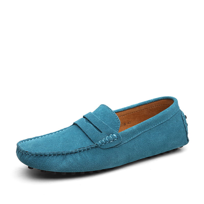 A teal suede leather loafer with a classic moccasin design and contrasting tan interior lining for men’s casual wear.