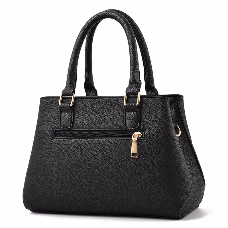 Black textured woven pu leather handbag with gold-tone hardware and top handles designed for luxury women handbags crossbody use.