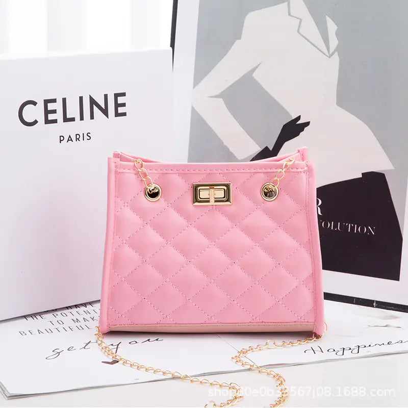 Pink quilted mini chain shoulder bag with gold-tone hardware and rhombus pattern small square design.
