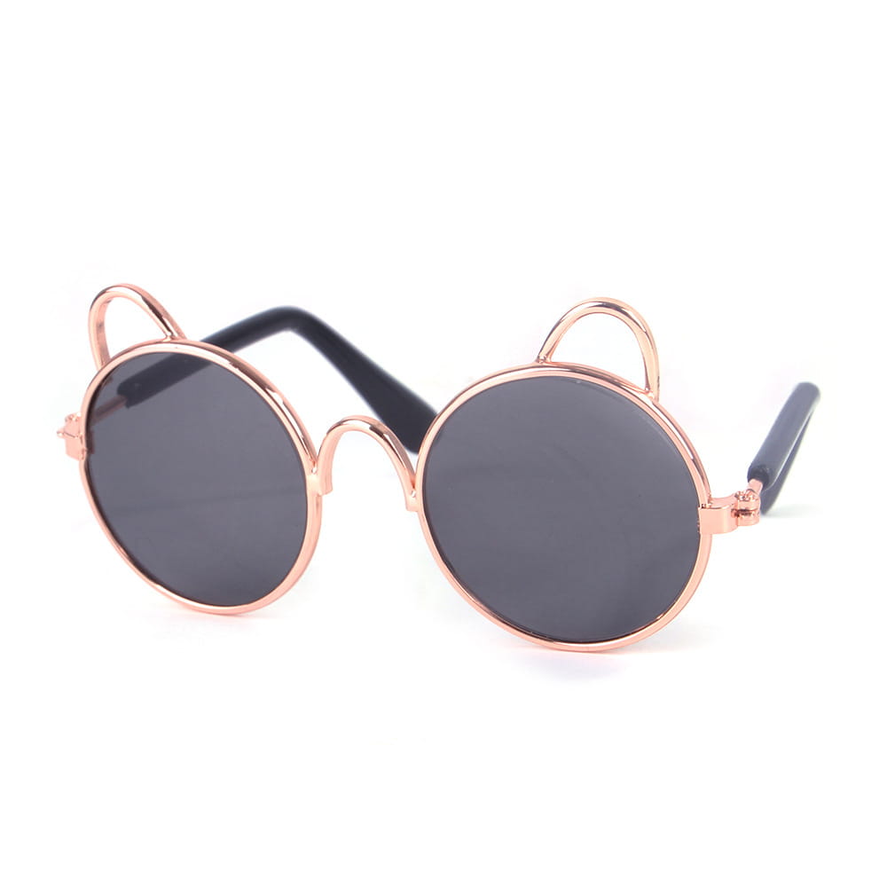 Rose gold cat ear pet sunglasses featuring dark gray lenses and black temple arms.