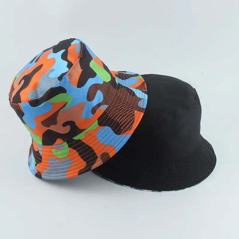 Reversible camouflage fisherman hat featuring a vibrant orange blue and green camouflage pattern with a black brim.