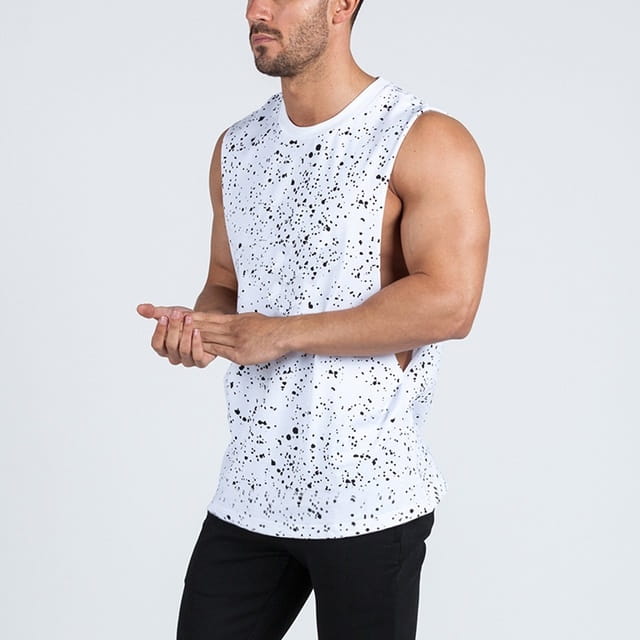 white sleeveless tank top with black speckle pattern made of lightweight material designed for men’s athletic use