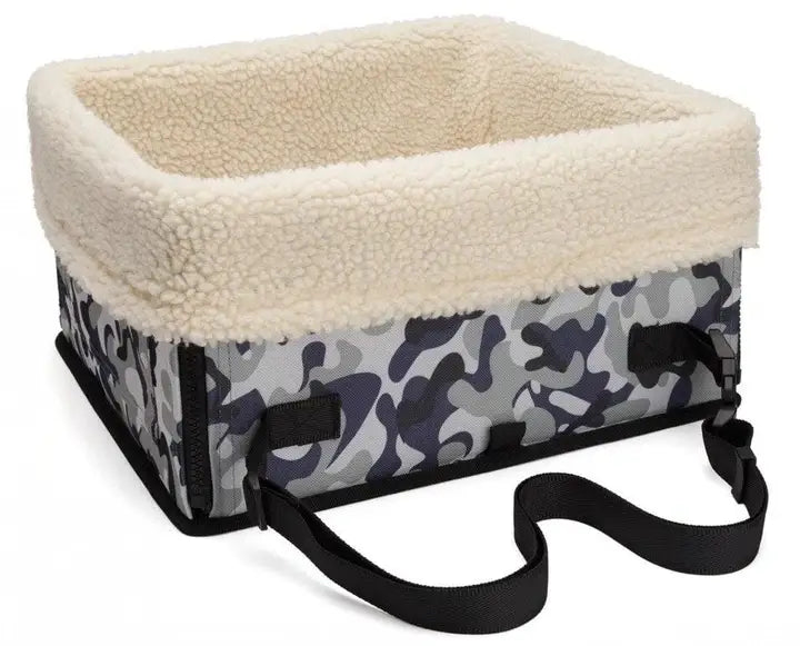 Elevated dog car seat portable waterproof pet booster in camouflage with plush cream-colored fleece interior and black adjustable straps.