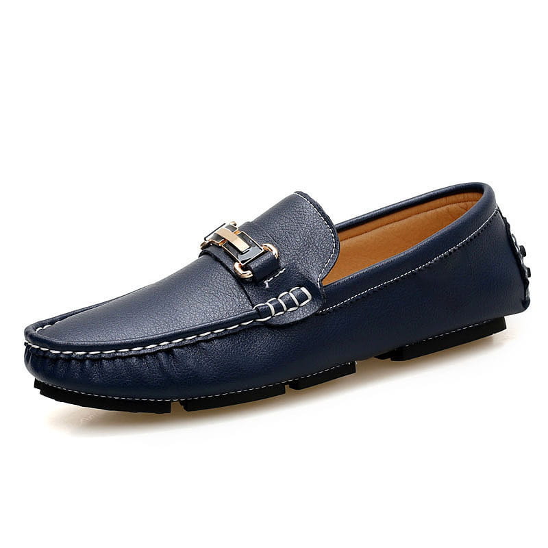 Navy blue leather men’s horsebit loafers with gold tone buckle white stitching and plush winter lining.