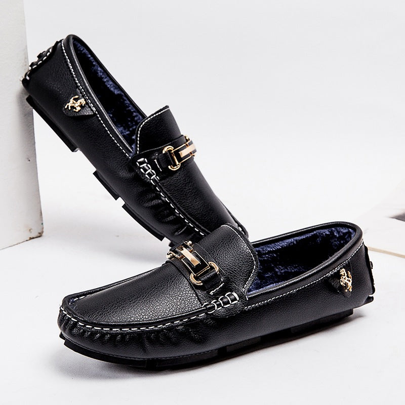 Men’s horsebit leather loafers in black with gold tone buckle accents and plush navy winter lining