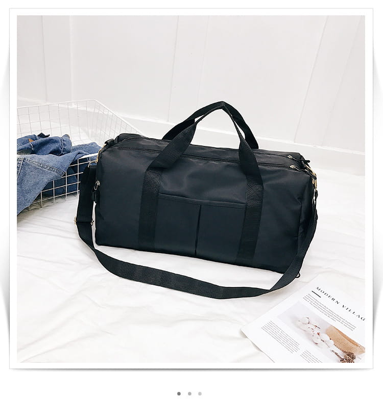 Black nylon duffel bag with dual top handles and detachable shoulder strap featured in the rose gold nylon waterproof sports duffel bag collection.