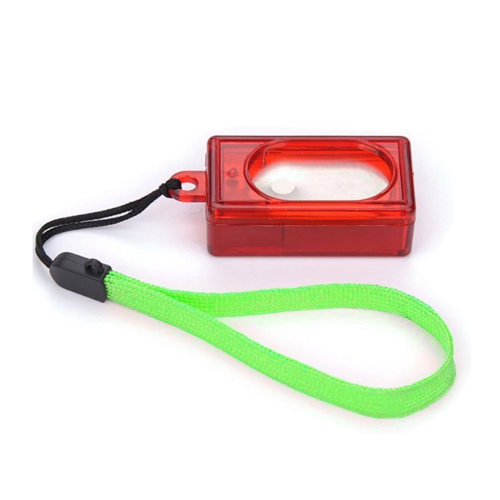 red transparent plastic dog training clicker with a bright green wrist strap and black clasp for pet training use