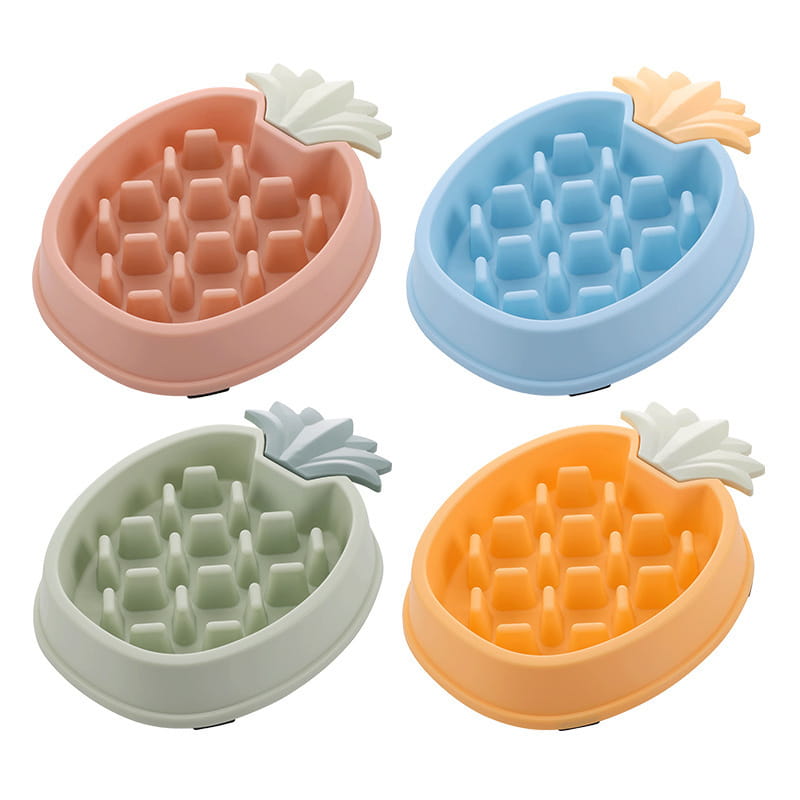 Cuencos para perros de alimentación lenta con forma de piña de plástico en rosa, azul, verde y naranja con tapas de hojas blancas, elaborados en plástico para alimentar a las mascotas.
