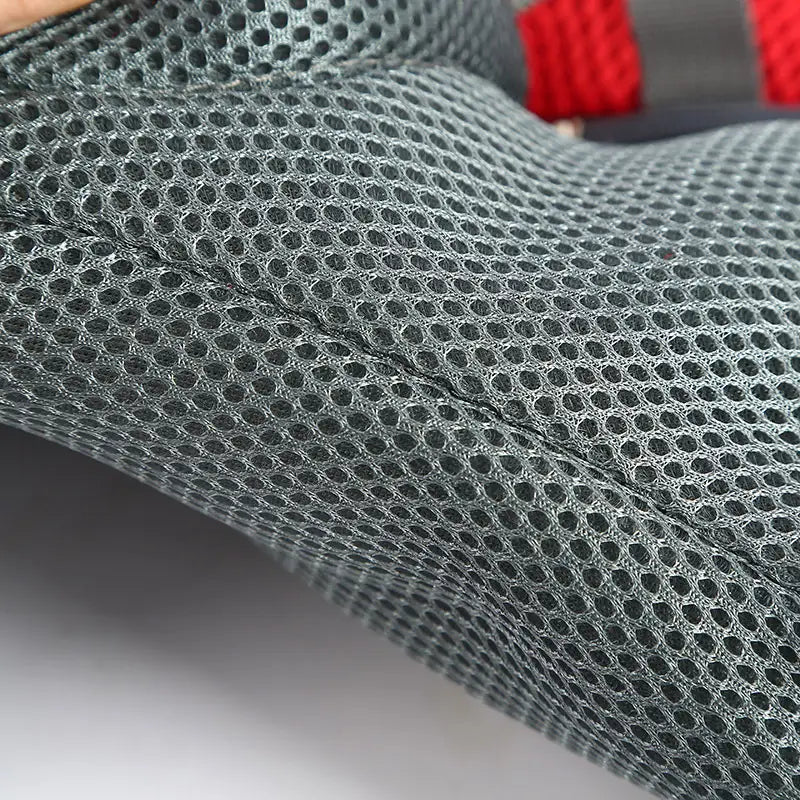 gray mesh fabric with a consistent circular hole pattern on the breathable mesh pet carrier backpack for enhanced ventilation.