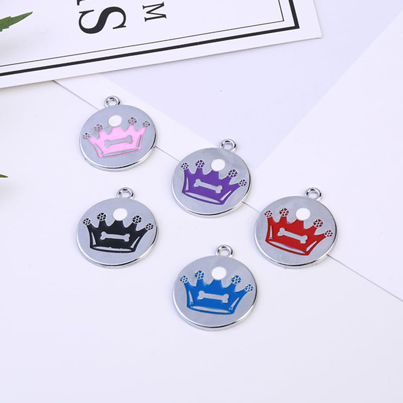 circular metal pet id tags with crown designs in pink purple black red and blue enamel in a crown enamel pet id tag 5 pack