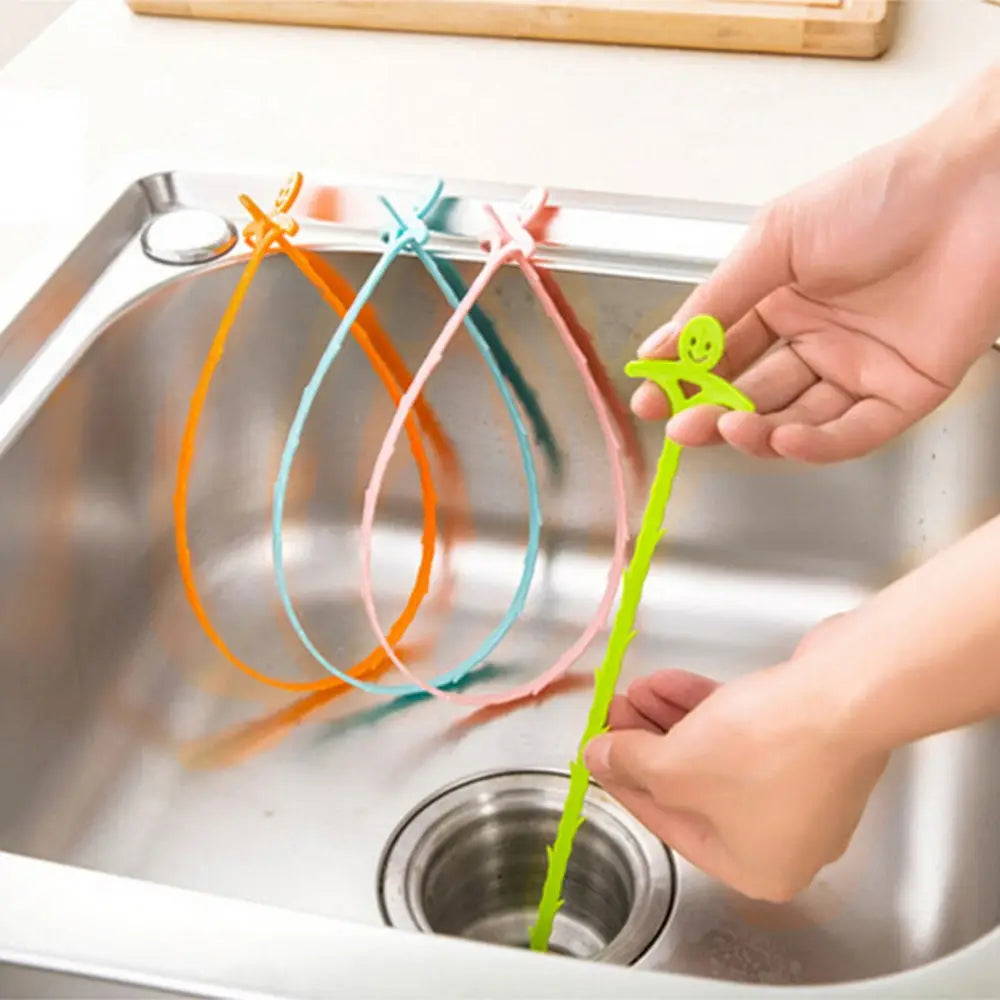 Crochet d’égouttage en silicone vert vif pour tuyaux de cuisine, serpent d’évacuation avec design de visage souriant, mesurant 51 cm.