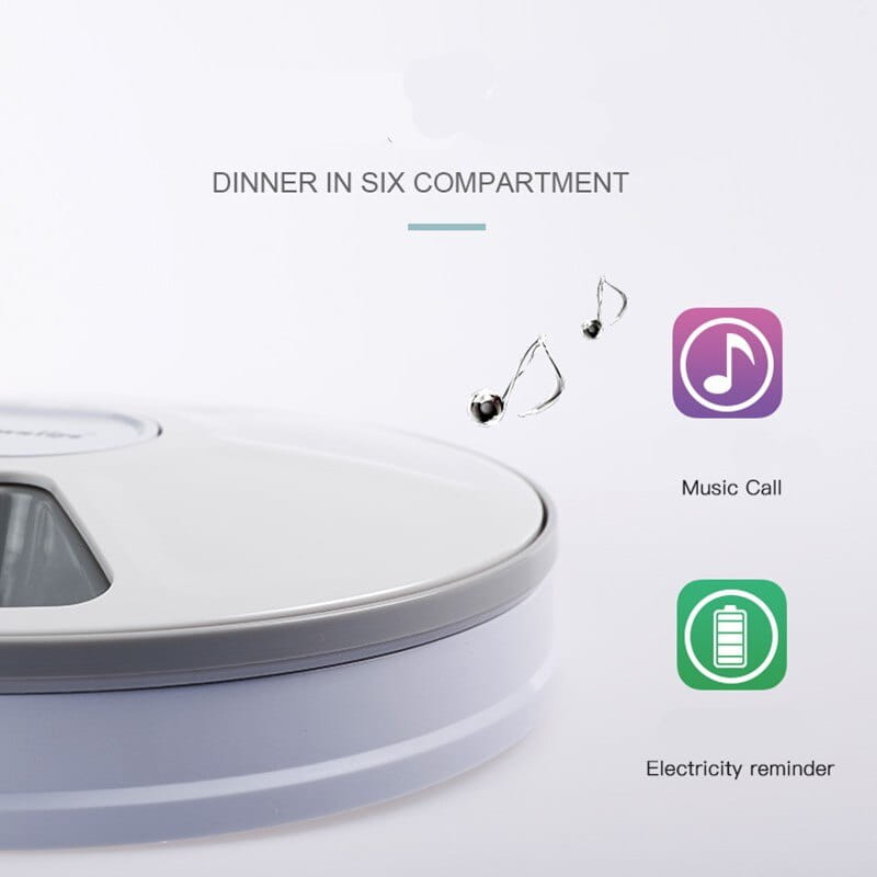 White and gray circular automatic pet feeder with six compartments and sleek modern design for timed meal dispensing for dogs and cats.