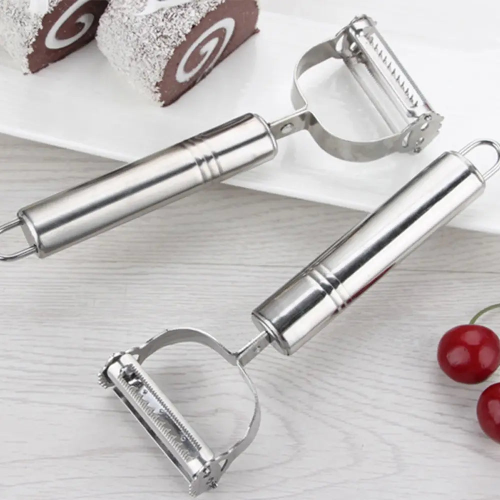 Two sleek stainless steel 2 in 1 potato peelers with polished handles and curved blades for peeling and julienne grating vegetables.