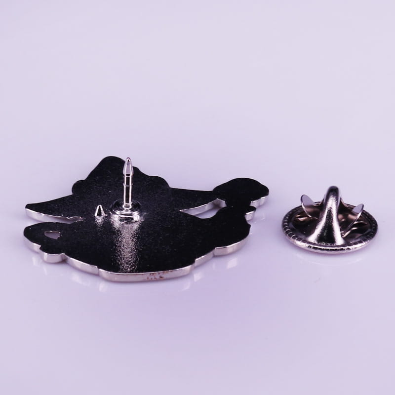 Black enamel pin shaped like a stylized wolf with silver-toned metal edges and backing featured in whimsical cat witch teapot enamel pin copper brooch design.
