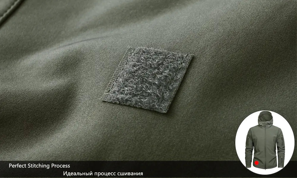 Dark olive green tactical waterproof softshell fleece jacket featuring a textured gray velcro patch on the chest.