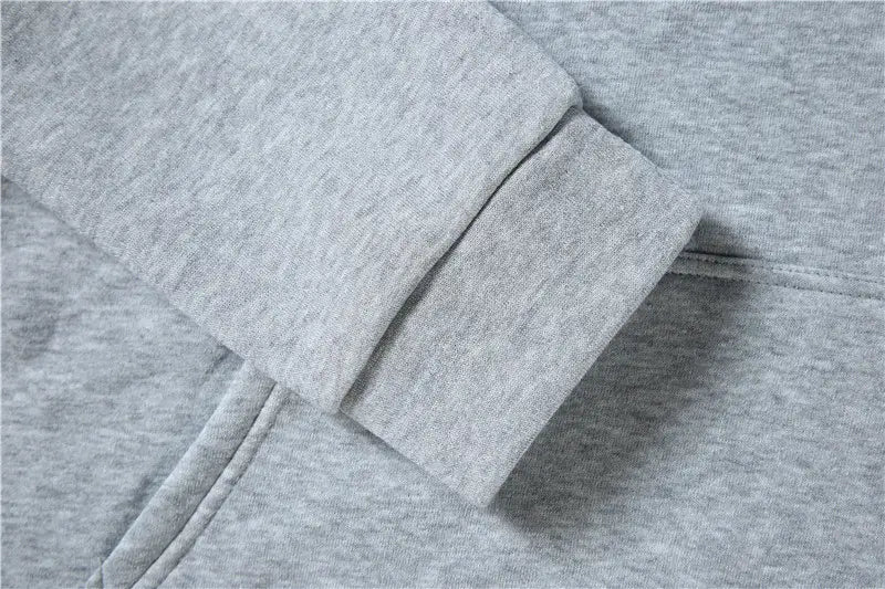 Grauer melierter Bündchenabschluss am Kapuzenpullover mit gerippter Strickdetailverarbeitung am Lil-Peep-Grafikdruck-Kapuzenpullover.