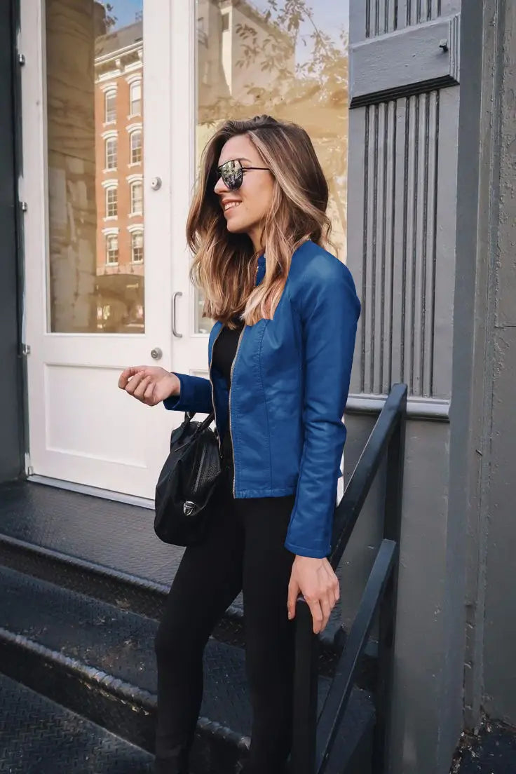 Blue leather moto jacket faux leather bomber jacket fitted zip up coat shown from the back side.