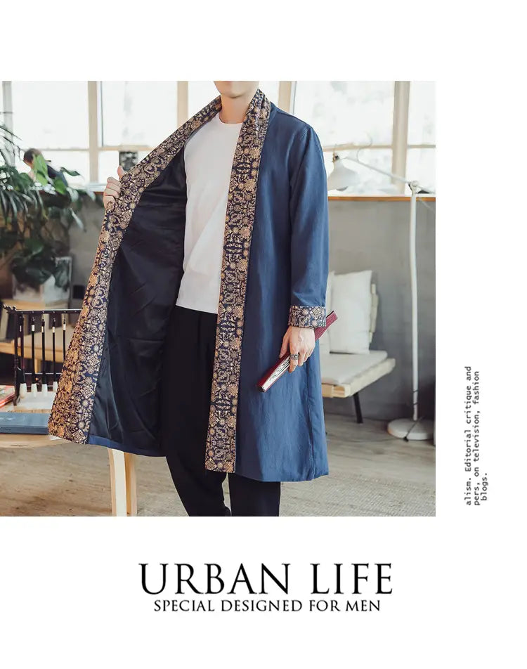 plus size dragon embroidered mens long coat in blue with intricate gold and black patterned trim along edges and cuffs