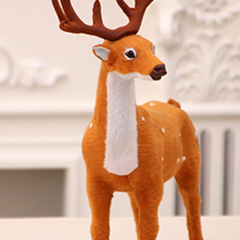 A plush orange deer figurine with white fur on its neck and chest, brown antlers, black eyes, a dark nose, and small white spots featured in a Christmas deer plush toy set with festive antlers.