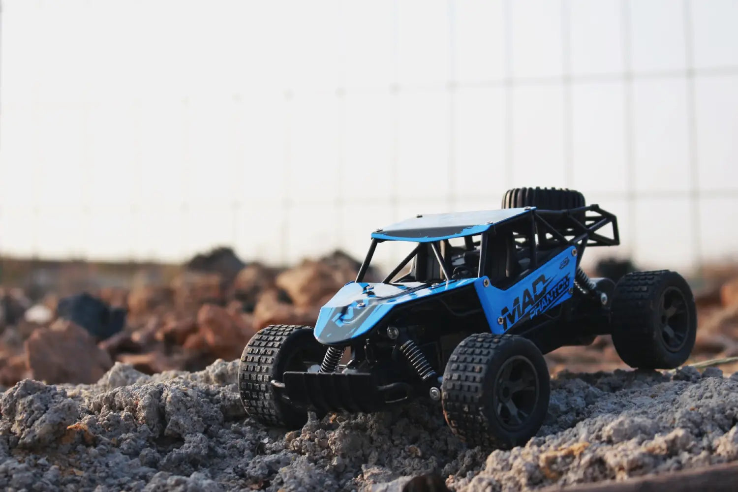 Blue and black rc drift car mad phantom off-road buggy 2.4g with rugged tires and detailed chassis for off-road use