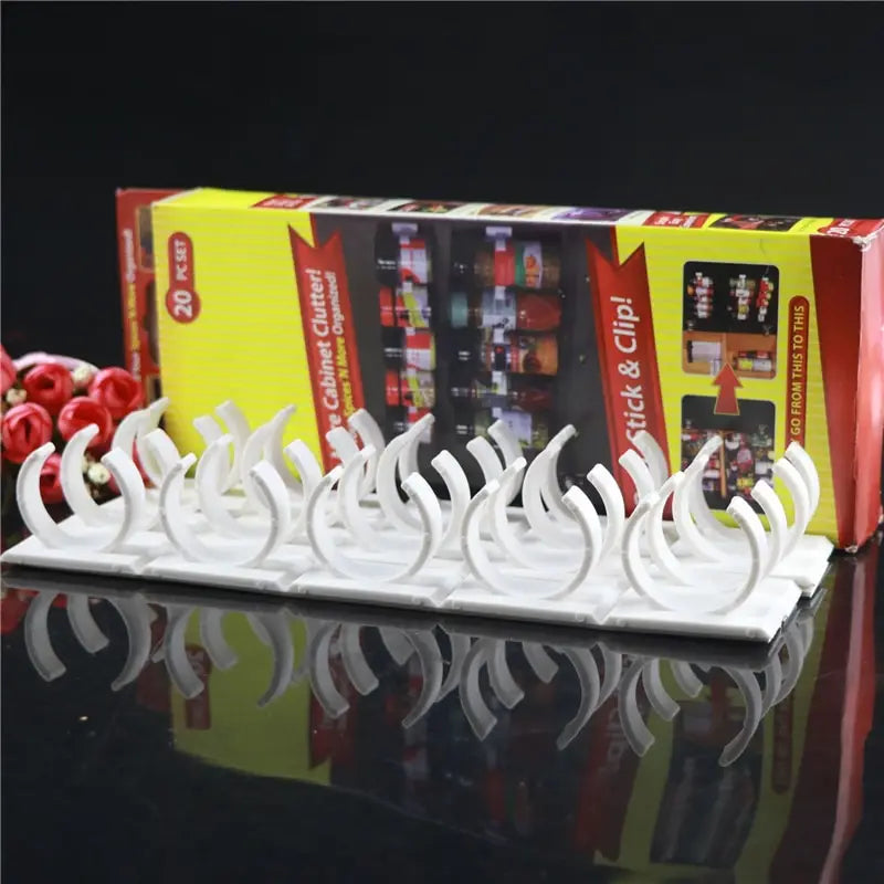white plastic spice rack organizer wall mount with 20 adhesive clips designed for stick-and-clip storage