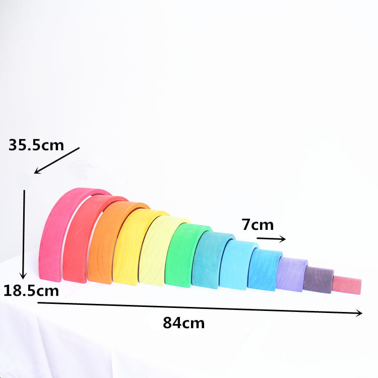 Rainbow wooden stacking arch bridge 12 piece puzzle toy featuring rainbow-colored wooden stacking rings in graduated sizes.