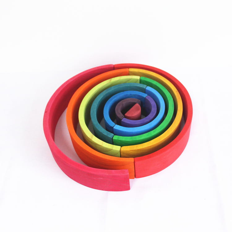 Rainbow wooden stacking arch bridge 12 piece puzzle toy featuring rainbow-colored wooden arches arranged in a spiral pattern.