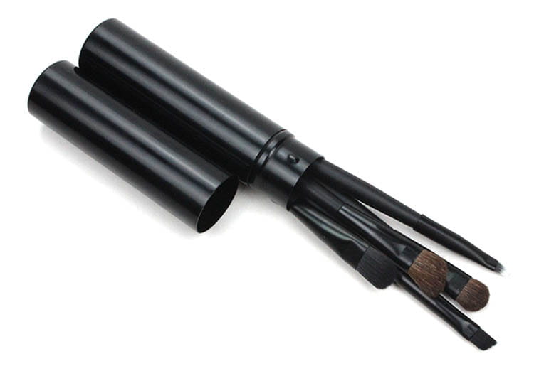 black cylindrical travel eye makeup brush set with assorted bristle types and sleek handles housed in a matching black portable case