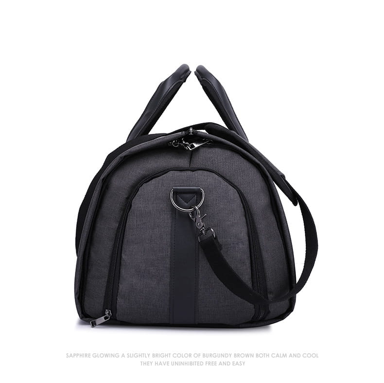 Black convertible garment travel bag with textured fabric body, reinforced black straps, zippers, and a shoe pocket.