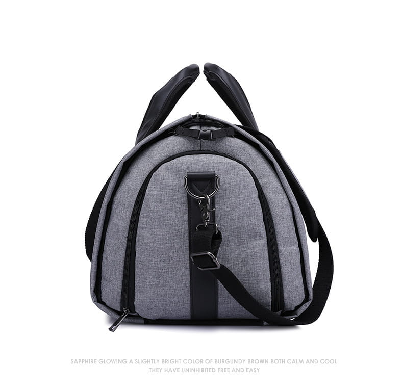 Gray textured fabric convertible garment travel bag with black handles and shoulder strap featuring a shoe pocket.