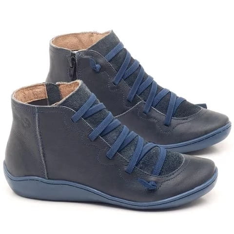 dark blue leather high-top sneakers with matching laces and a subtle textured pattern on the toe box designed as snake print wedge ankle boots for women.