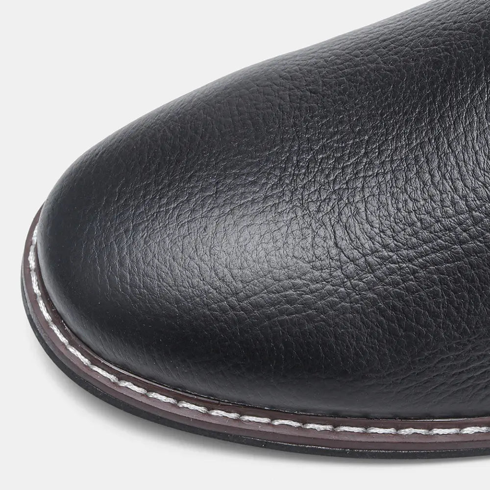 Men’s lychee pattern cowhide Chelsea Martin boots in black leather with pebbled texture and white sole stitching