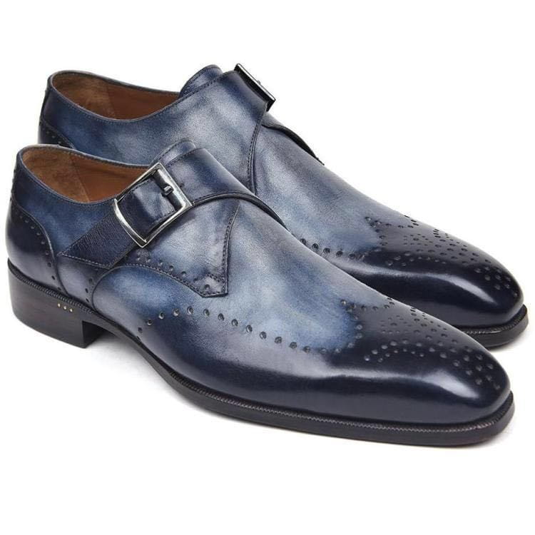 Men’s dark blue leather monk strap dress shoes with subtle patina finish and silver-toned buckle for formal wear.