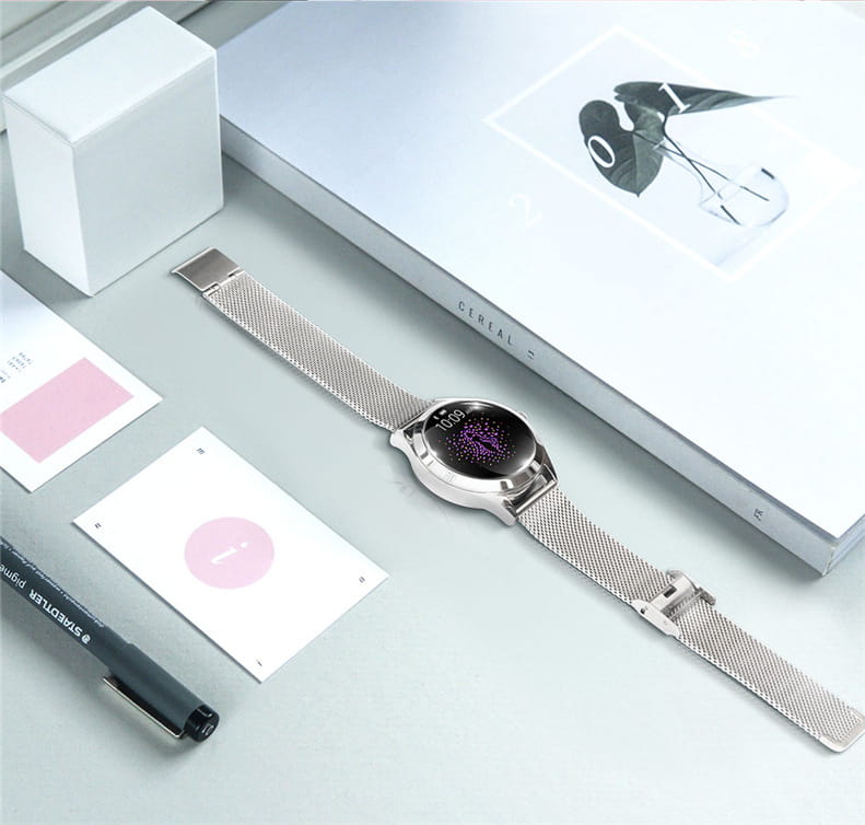 Silver mesh band smartwatch with a circular face displaying purple digital numbers featured in a rose gold butterfly smartwatch with stainless steel mesh band product.