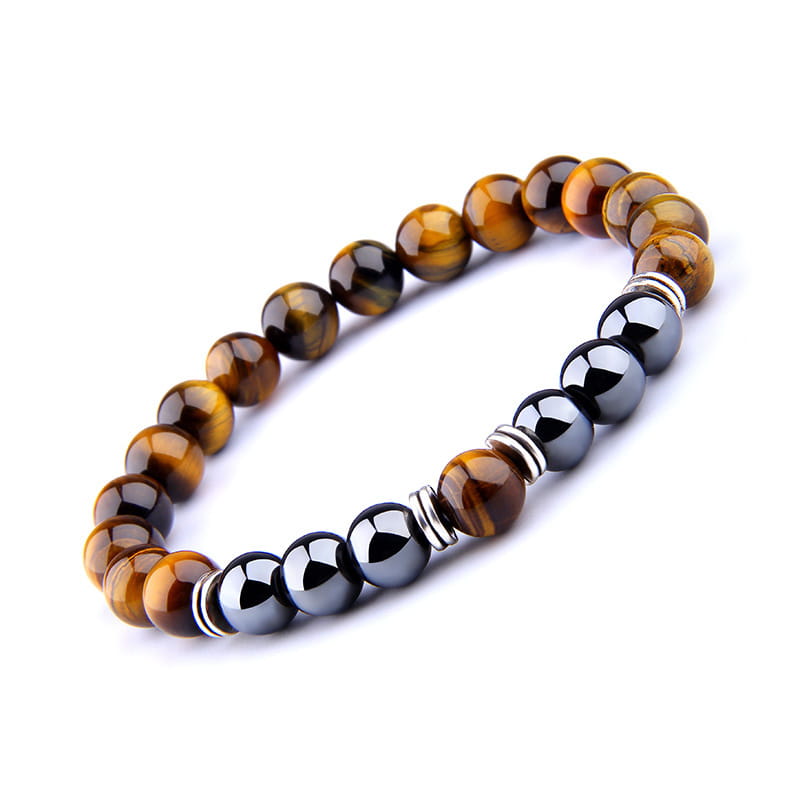 A sleek tiger eye and black magnetic obsidian beaded elastic bracelet with silver-toned spacers.