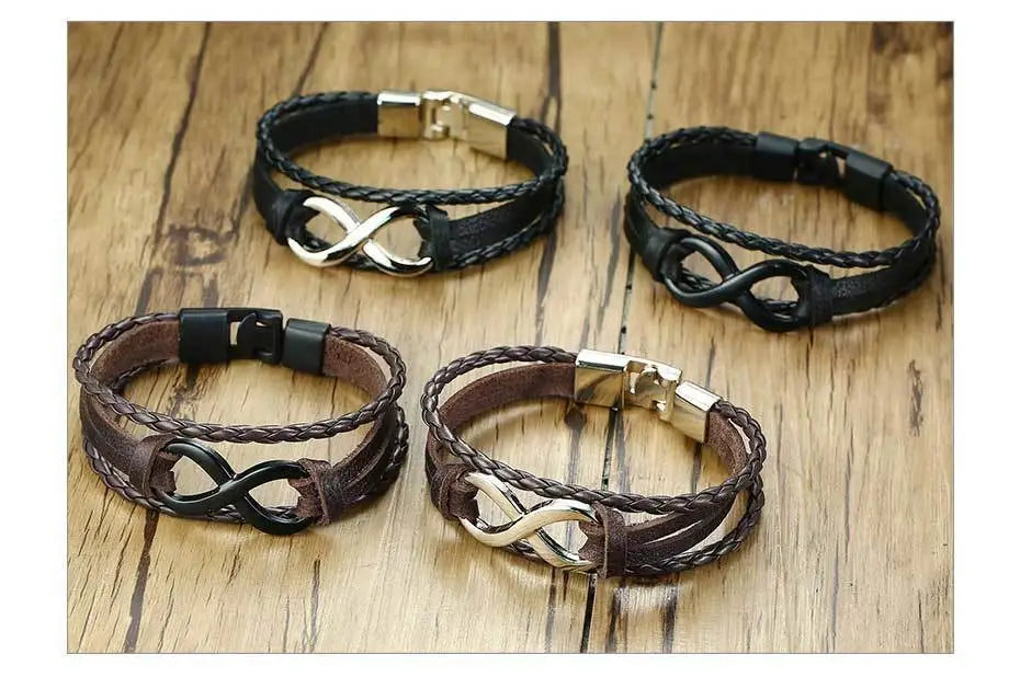 Unisex braided leather infinity and nautical charm bracelets in black and brown featuring infinity symbol clasps.