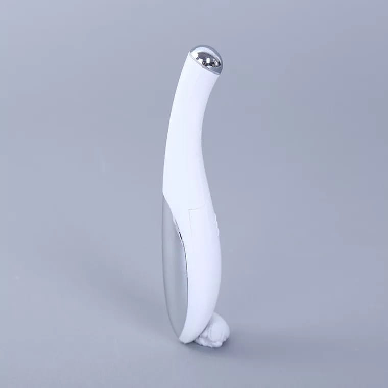 white and silver facial roller eye massager with a sleek ergonomic design for wrinkle and dark circle removal