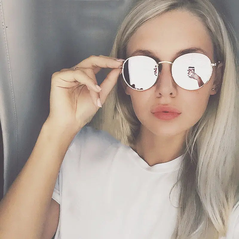 Round reflective silver-framed sunglasses with mirrored lenses from the rose gold and metallic aviator mirror lens sunglasses set.