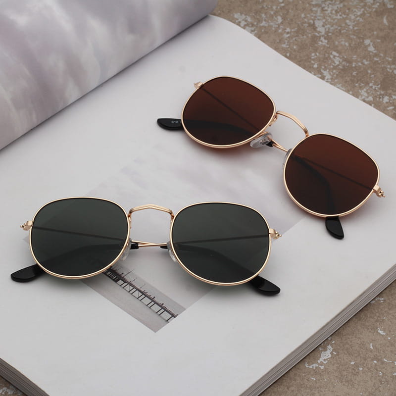 Rose gold and metallic aviator mirror lens sunglasses set featuring gold-rimmed round sunglasses with dark brown and black lenses, sleek metal frames, and black temple tips.