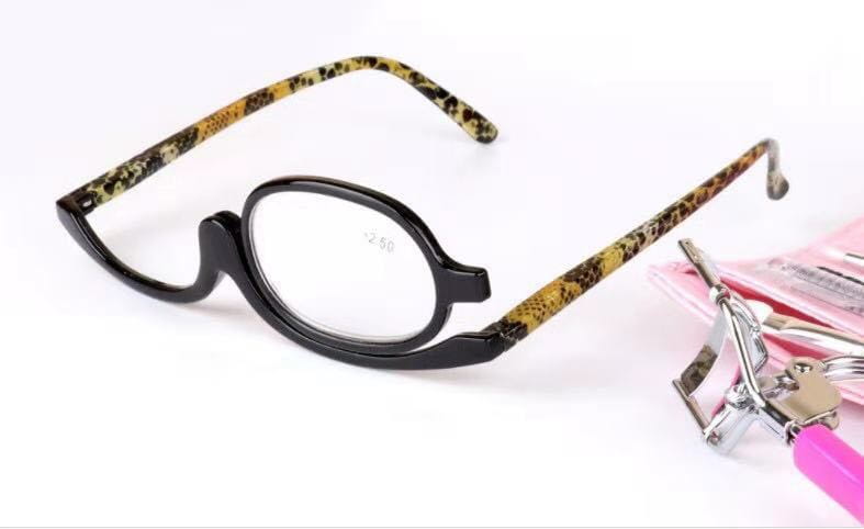 Black-framed makeup reading glasses with tortoiseshell-patterned arms in a plus 2.50 strength variety pack.
