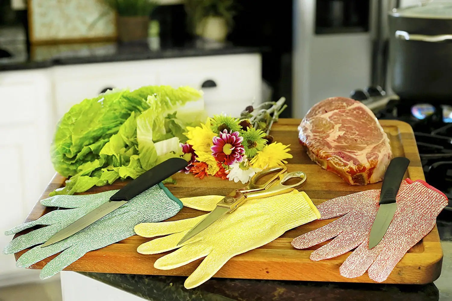 Three pairs of colorful cut resistant work gloves in green yellow and pink made of HPPE material are displayed on a wooden cutting board with fresh vegetables flowers and meat.