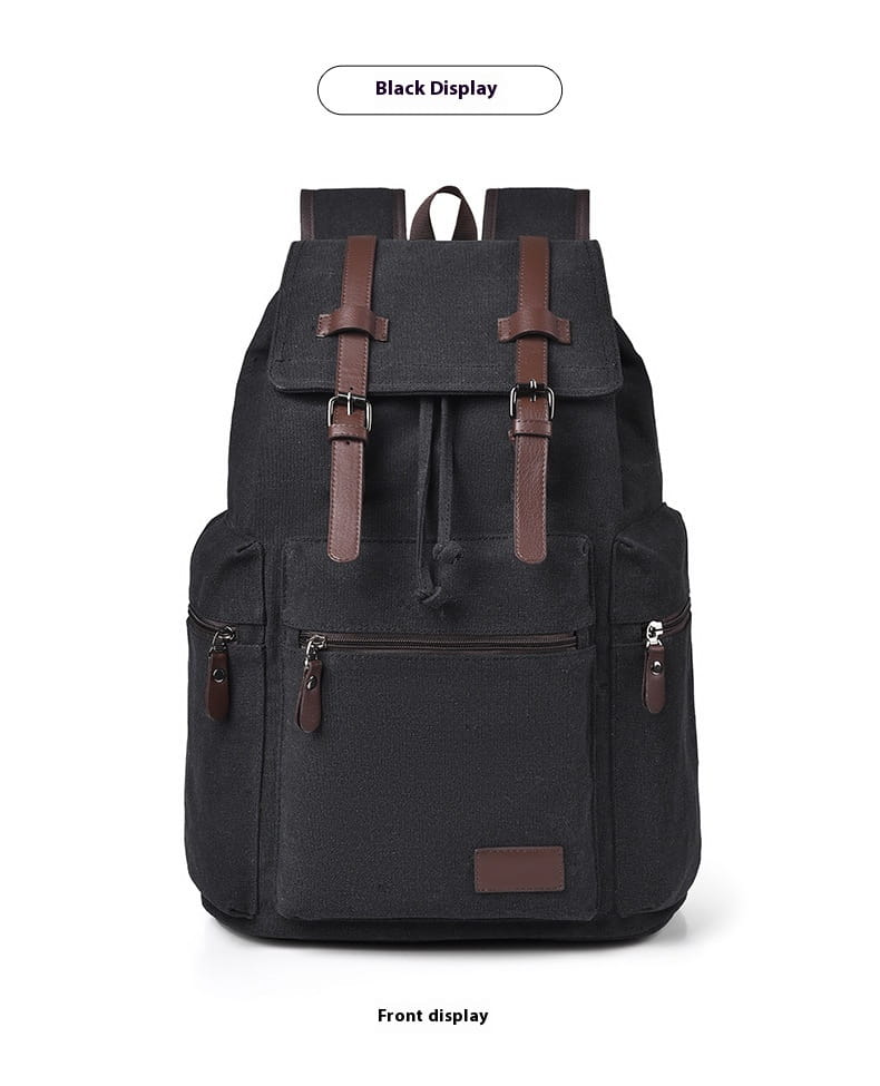 Black canvas travel backpack with brown leather straps and accents designed for men with large 20-35l capacity.
