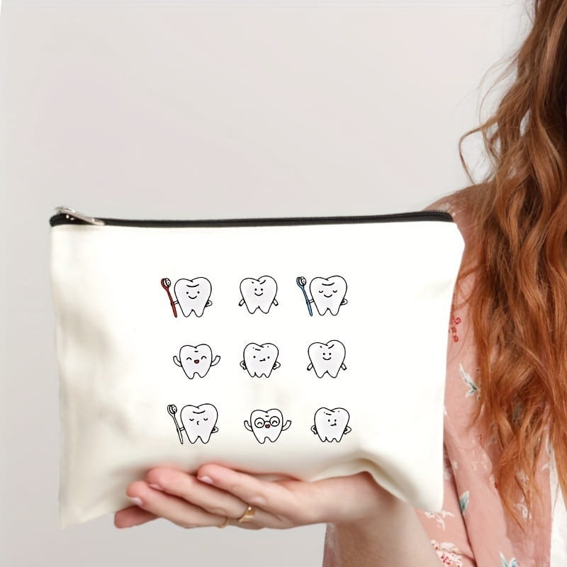 white canvas tooth pouch with black zipper featuring a playful design of nine cartoon teeth each holding or wearing different dental accessories for travel use