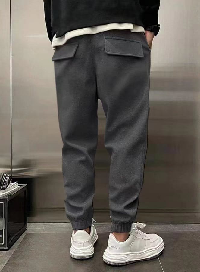 men’s fleece drawstring sweatpants in dark gray featuring two front pockets and elastic cuffs for comfortable casual wear.