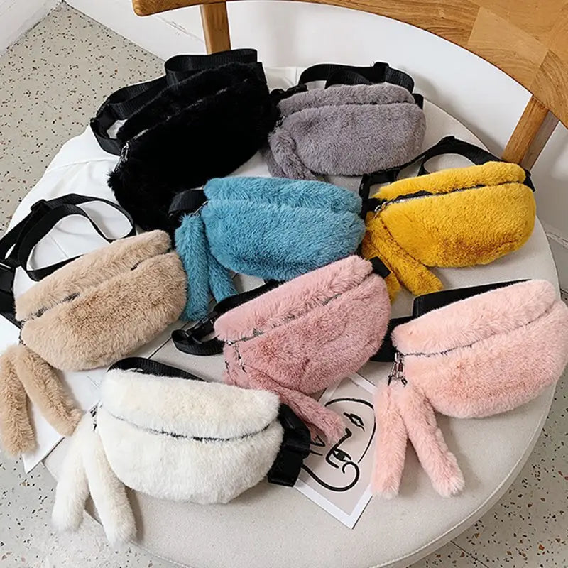 a collection of plush faux fur fanny pack crossbody messenger bags in black gray blue yellow pink beige and white colors showcasing their fuzzy texture and versatile use.