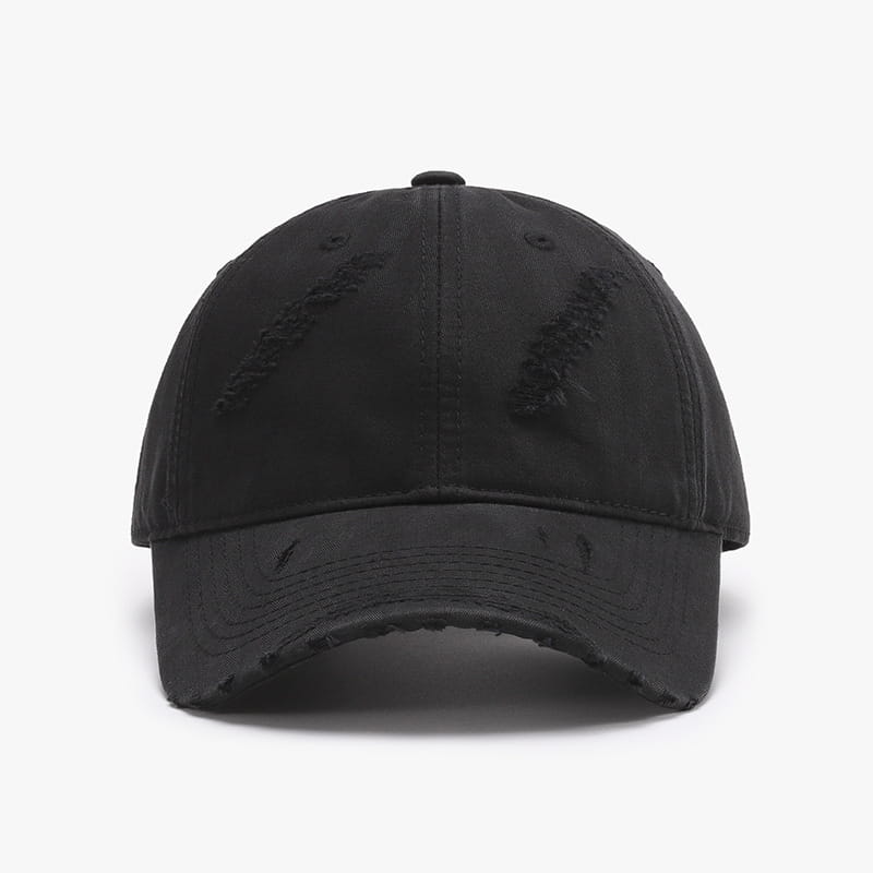 Black distressed denim baseball cap with frayed brim and intentional tear details made of ripped cotton for men.