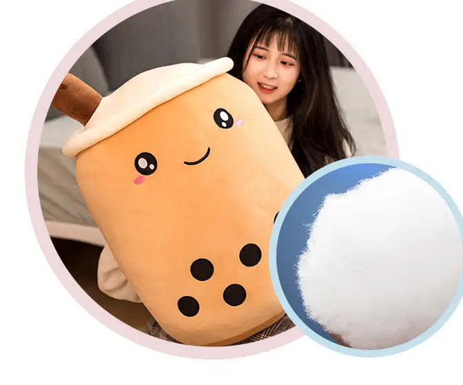 Cute orange plush soft boba tea pillow toy featuring black tapioca pearls and a white foam top.