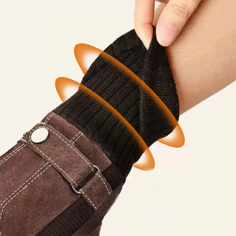 black ribbed knit wrist warmer with brown suede strap and silver-toned metal buckle on the back side of men’s touch screen winter leather gloves.